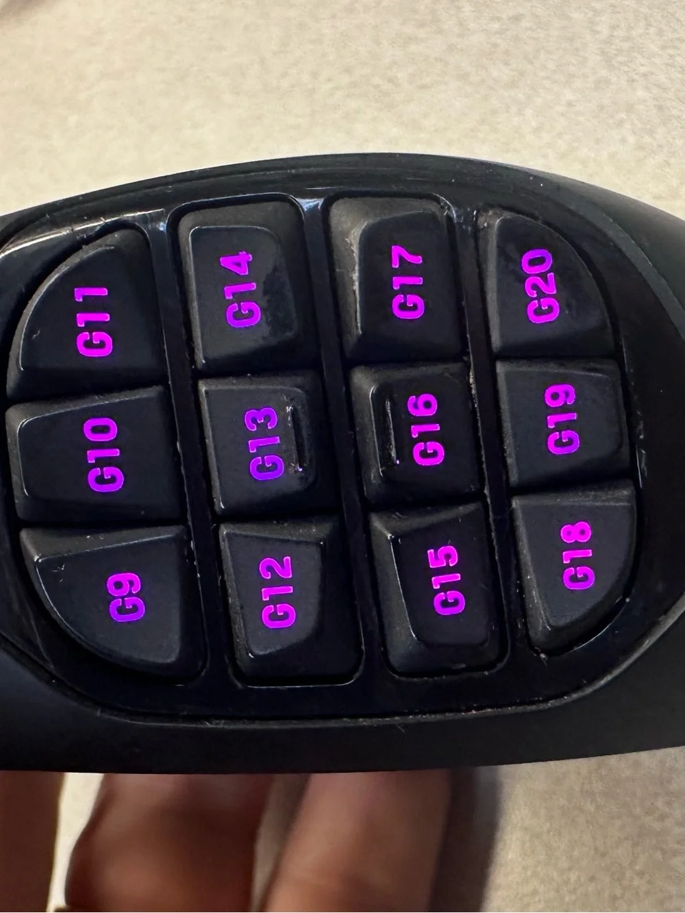 Logitech G600 Black Wired Ergonomic Gaming Mouse with 12 button thumb grid.